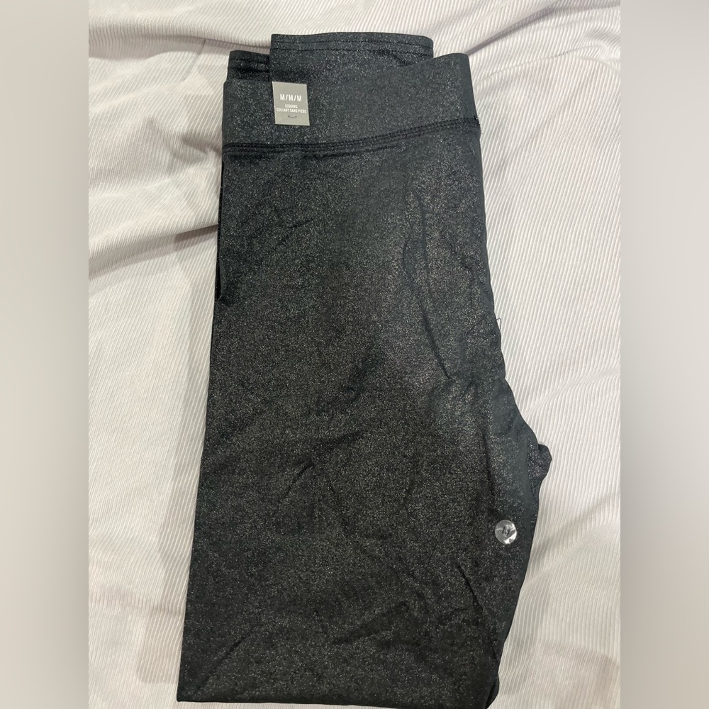 Never worn black with sparkles leggings